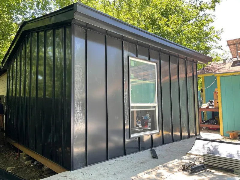 Black standing seam metal wall panels for Roof Inspection in Jacksonville Beach